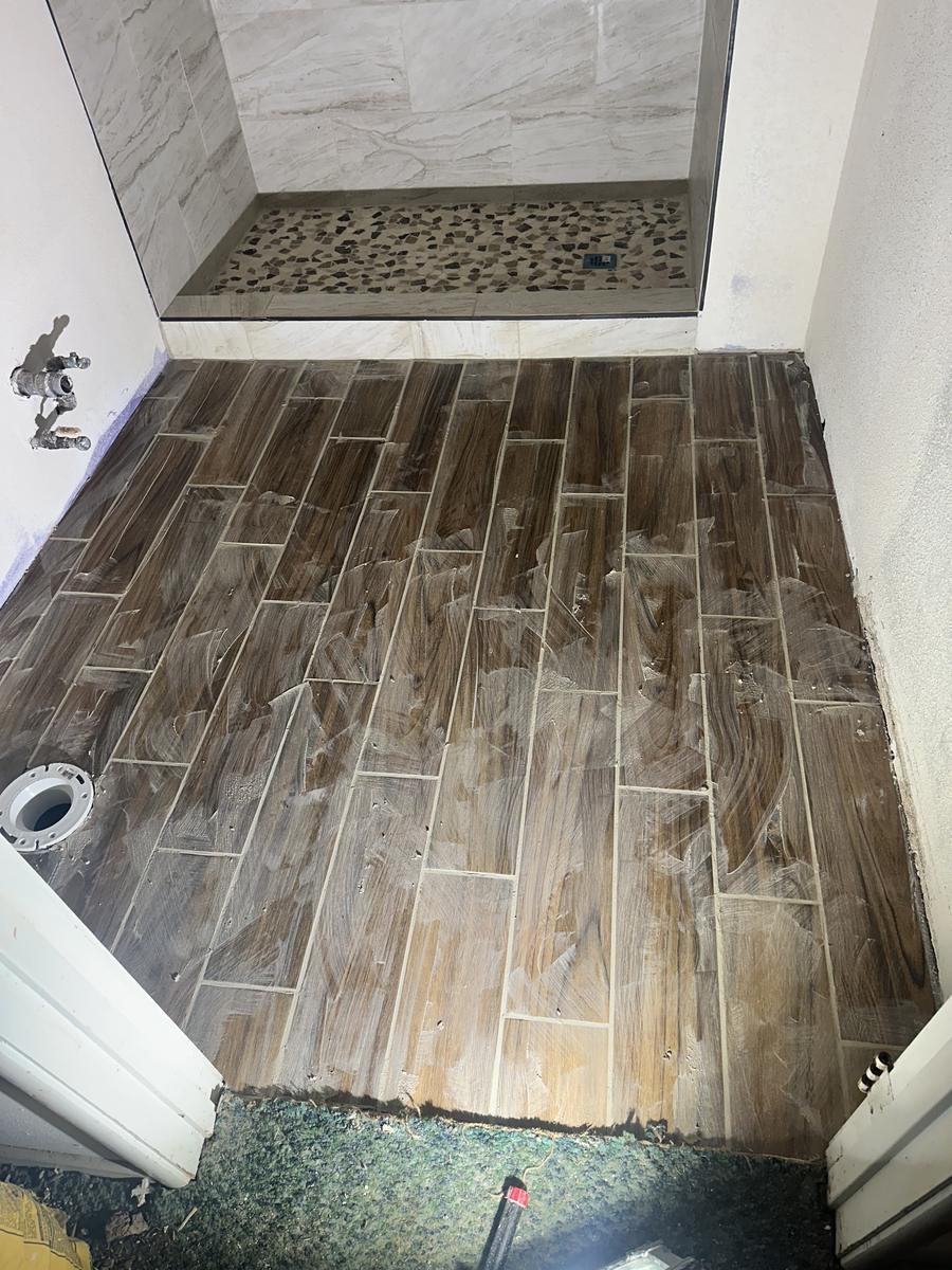 Pebble shower pan